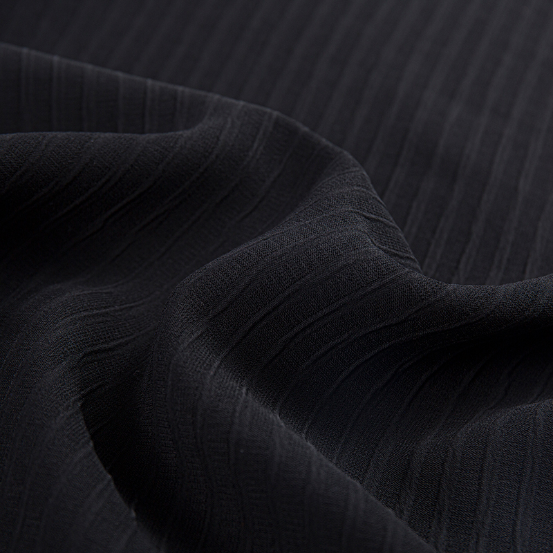 نسيج مُقَلَّم بِشَكْل الفَقَّاعات